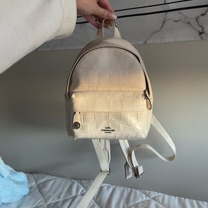 White mini Coach backpack